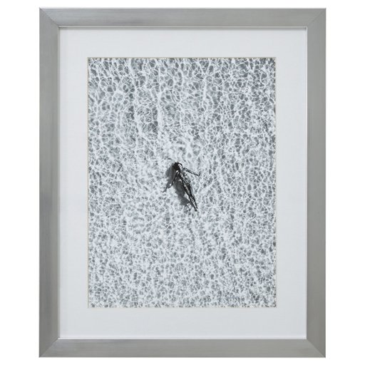 Amazon Brand – Rivet Modern Black and White Floating Woman Photo Print Framed Wall Art Decor - 13 x 15 Inch Frame, Silver